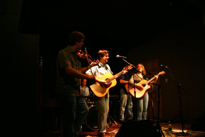 Jamie plays violin with Third Road Home